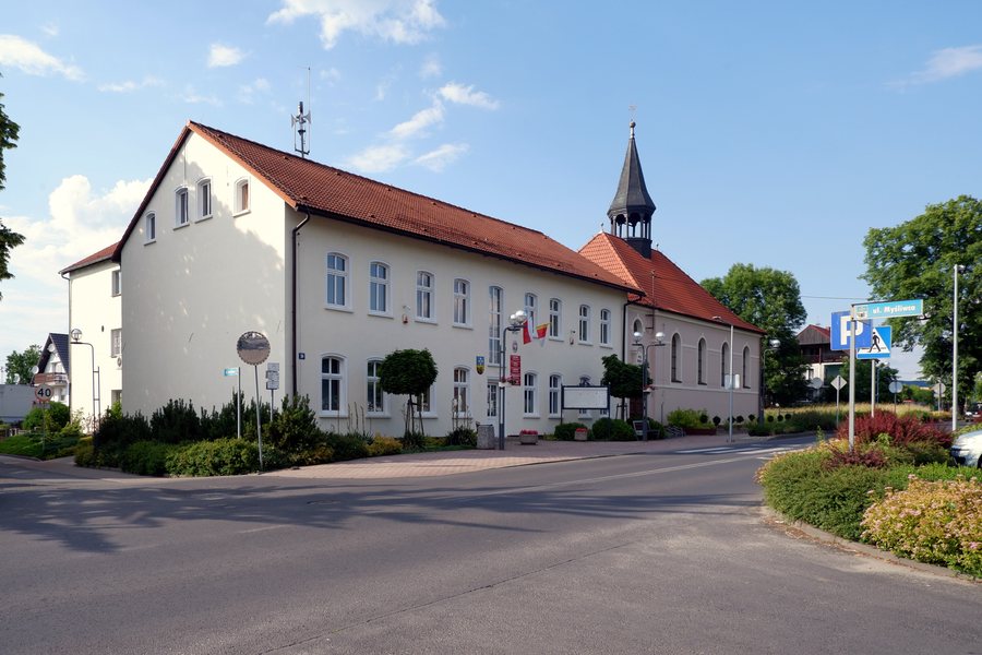 Town hall and the old Saint Anthony church in Zdzieszowice, Poland